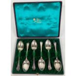 A cased set of early 20th century silver teaspoons, hallmarked for Sheffield 1901. Each with James