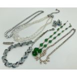 A collection of vintage glass beaded and stone set jewellery, mostly necklaces. To include