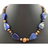 A 14" costume jewellery necklace made from tigers eye and lapis lazuli beads. With silver tone