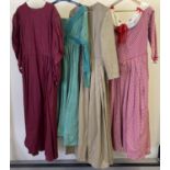 4 vintage theatre costume dresses in varying styles and colours.