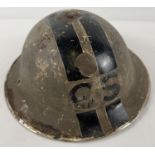 A British MkII WWII Home Front steel helmet painted cream with 2 longitudinal black bands and