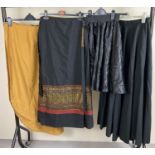 4 theatre costume skirts in varying lengths, styles and sizes.