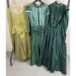 3 vintage Victorian style theatre costume dresses in green tones.