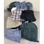 A box of men's assorted clothing to include trousers, shirts and jumpers. Lot includes: Cedarwood