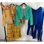 3 items of Oriental style theatre costume. To include a pair of wide leg blue satin trousers with