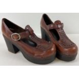 A pair of vintage 1970's leather platform dolly shoes by Manfield, size 38/5.