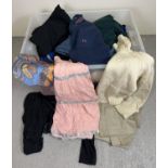 A large box of assorted ladies & men's clothing, to include skirts, trousers, tops and jumpers.
