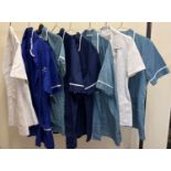 9 assorted nursing, care and medical staff tunic tops.