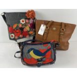 3 branded handbags. A faux leather tote bag by Nica (new with tags), a tweed style over the body bag