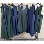 8 theatre costume adult sized blue and green school pinafore dresses.