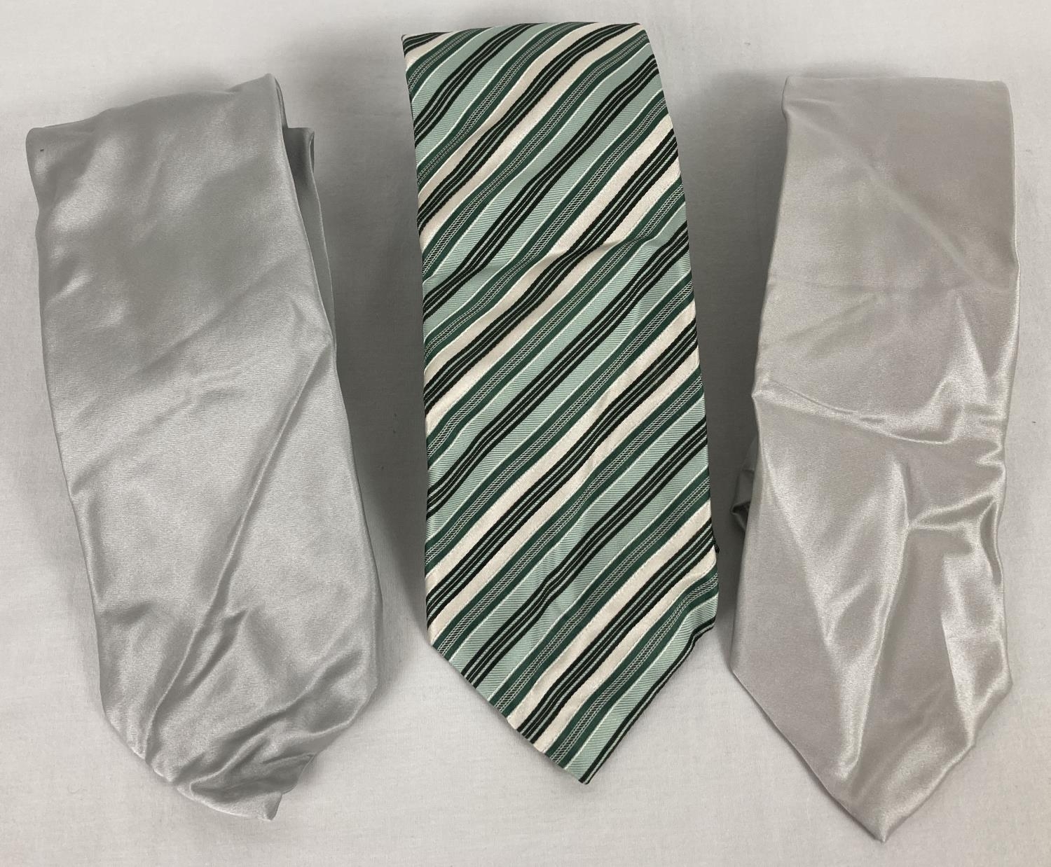 3 vintage Brioni men's silk ties. 2 in plain natural colours and a striped green tie.