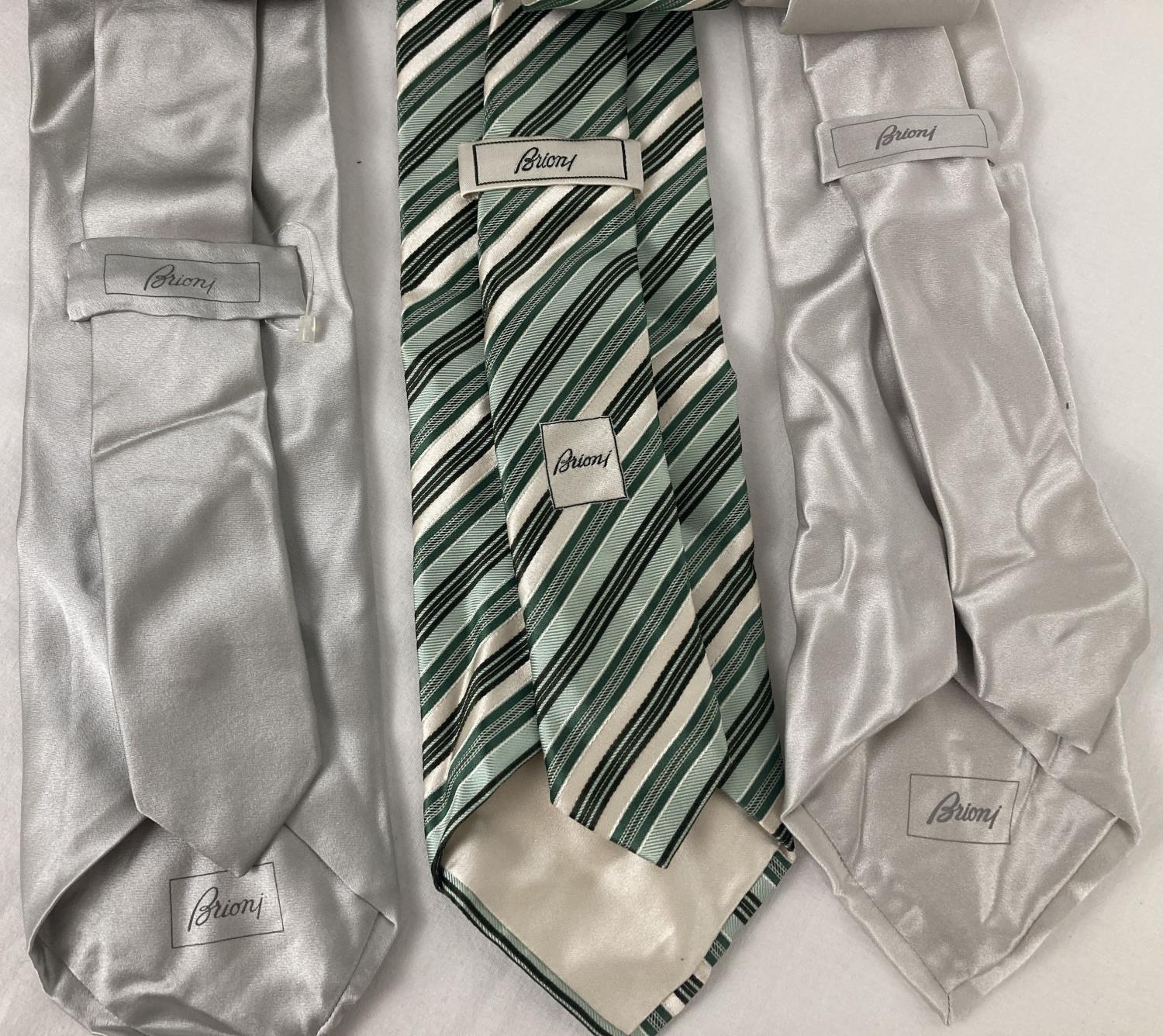 3 vintage Brioni men's silk ties. 2 in plain natural colours and a striped green tie. - Image 2 of 2