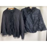 2 Victorian black fabric capes with lace trim.