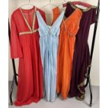 4 theatre costume Grecian style full length dresses in varying colours.