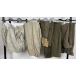 7 assorted pairs of military style trousers and shorts. In varying conditions.