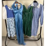 4 theatre costume dresses in blue and green tones. To include blue satin halter neck dress.