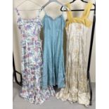 3 vintage 1950's cocktail/evening dresses with thin straps. To include pale gold floral design satin