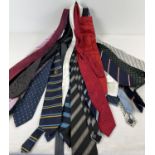 A quantity of modern & vintage men's neckties, only a hanging tie rail. To include examples by