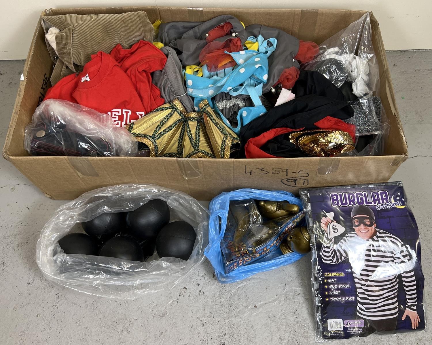 A box of assorted theatre costume accessories and props. To include some new items.