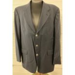 A mens navy blue, button fronted wool blazer by Kenzo. Needs dry cleaning, size 52.