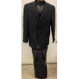 A mens black Armani Collezioni wool 2 piece suit. Needs dry cleaning, trousers approx. 34 inch,