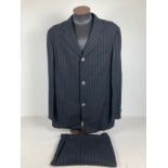 A mens Versus by Gianni Versace double pinstriped suit. Trousers 36/50, jacket 38/52.