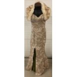 A Terani Couture evening dress with faux fur stole, of metallic floral design with slit skirt.