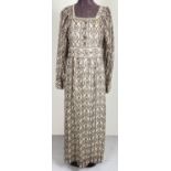 A vintage 1960's long sleeved, fully lined dress by Dolly Rockers, designed by Sambo. With lace trim