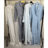 4 vintage dressing gowns and house coats, in white and blue tones.