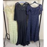 3 vintage 1970's full length dresses to include green floral chiffon dress and blue lace dress