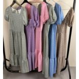 6 matching theatre costume dresses in varying colours.