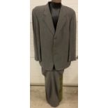 A Giorgio Armani Le Collezioni grey 2 piece suit. Needs dry cleaning, small hole to right lapel,