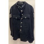 A vintage black military style jacket with Firmin Hong Kong Volunteer Corps buttons and '8' collar