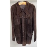 A Men's vintage 1970's brown suede long length jacket with 4 front pockets.