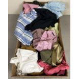 A box of assorted ladies wear to include tops blouses, jackets and skirts.