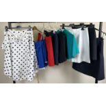 12 theatre costume & gym skirts in varying colours, materials & lengths.