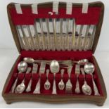 A vintage wooden cased canteen of cutlery by Webber & Hill with Kings pattern handles. 43 pieces (