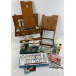A box of assorted art supplies to include new and nearly new items. Lot includes: sealed box of