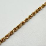 A 9ct yellow gold 7" twist design rope chain bracelet with spring ring clasp. Stamped 9k to clasp.