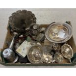 A box of mixed silver plated items. To include serving trays, cigarette cases, candlesticks, trinket
