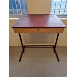 A modern metal framed slope fronted desk with lift up lid, painted burgundy. Approx. 90cm tall x