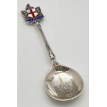 An antique silver spoon with St. George flag, dragons and "London" Finial. The Guildhall detail to