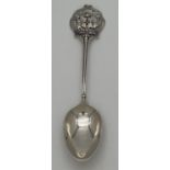 An antique silver collectors spoon with decorative finial depicting a kangaroo, emu and Australian
