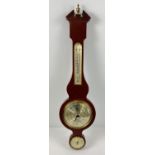 A vintage Metamic dark wood framed barometer and thermometer with brass detail. Approx. 68cm tall.