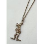 A Walt Disney Productions, hallmarked silver 'Goofy' pendant on a 20" white metal chain. Pendant