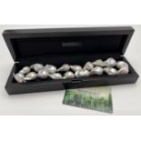 A boxed 18 inch Rhapsody organic fresh water large baroque pearl necklace with platinum clasp.