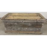 An antique 2 handled pine box with drop down handles and dove tail joints. Some damage to lid.