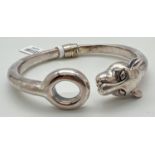 A 925 silver spring hinged bangle by The Jewellery Channel with leopard head finial. Complete with