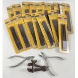 A collection of 18 packets of unopened Rolson 150mm junior hacksaw blades together with a small