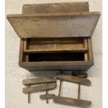 A vintage pine tool box with interior draw together with wooden clamps.